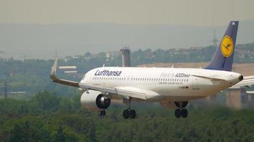 FRANKFURT AM MAIN, GERMANY JULY 19, 2017 - Lufthansa Airbus A320Neo D AINB approaching on runway 25R. Fraport, Frankfurt, Germany video