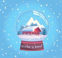 el invierno está aquí globo de nieve con una pequeña casa, montañas y abetos bajo la nieve. regalo de año nuevo. paisaje nevado de invierno con ilustración de vector plano de copos de nieve en colores rosa menta.
