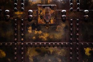 Close up of brown vintage old metal treasure chest. photo