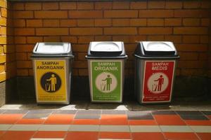 Semarang, Indonesia - December 03 2021, Editorial image of the three types of trash in historic building lawang sewu in semarang city central java Indonesia photo