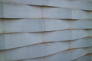 wall of white bricks arranged in a zig zag photo