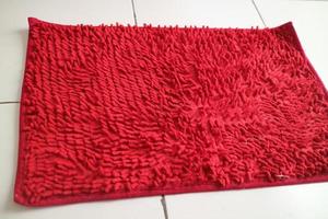 red mat on the tiled floor photo