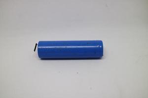 blue lithium battery on white background photo