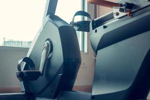 Exercise equipment in an indoor fitness center photo