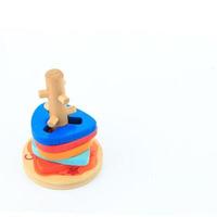 colorful wooden toys on a white background photo