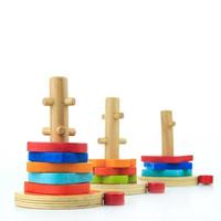 colorful wooden toys on a white background photo