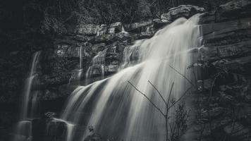 The waterfall in the big forest is very beautiful and less known and dangerous during the rainy season. photo