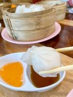 Dim sum top view and text input area, dim sum Chinese food in steamed bamboo is popular all over the world. photo