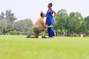 Happy pregnant woman with his husband photo