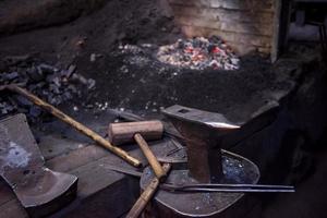 Working tool at blacksmith traditional workshop photo