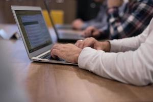 programmer writing programming code photo