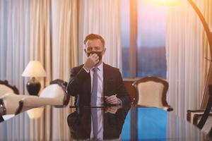 business man wearing protective face mask at office photo