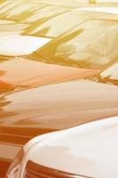 Roofs of several cars. A lot of cars stand close at rush hour photo