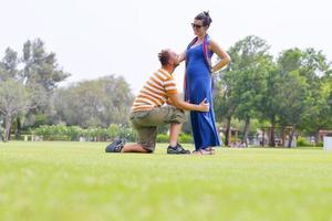 Happy pregnant woman with his husband photo
