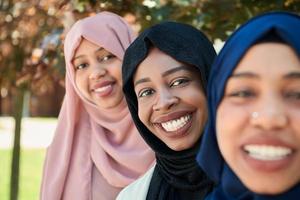 businesswoman group portrait  wearing traditional islamic clothes photo