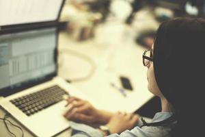 programmer writing programming code photo