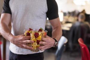 software developer eating a fruit salad photo