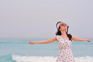 Happy Beautiful Woman Enjoying Summer Vacation photo