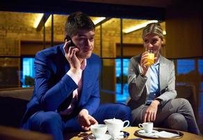 business couple take drink after work photo