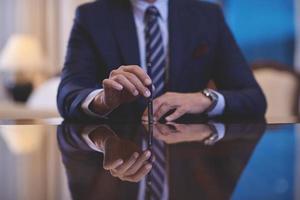 corporate businessman holding  pen photo