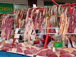 Almaty, Kazakhstan, 2019 - Selection in the meat section of the famous Green Bazaar in Almaty, Kazakhstan photo