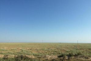 The wide Steppe landscape in Kasakhstan photo