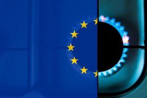 unión europea y crisis del gas - bandera de la ue sobre una estufa de gas foto