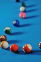 young man play pro billiard game photo