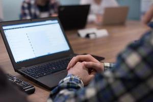 programmer writing programming code photo