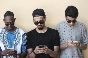 multiethnic startup business people group using smart phones photo