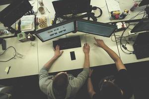 young programmers writing programming code top view photo