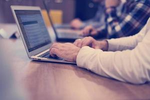 programmer writing programming code photo