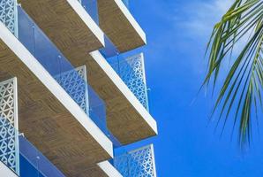 Typical street cityscape buildings apartments of Playa del Carmen Mexico. photo