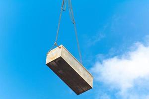 hanging on the rope of a crane photo