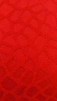 Close-up of red texture fabric cloth textile background photo