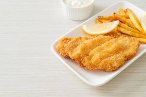 fish and chips - fried fish fillet with potatoes chips photo