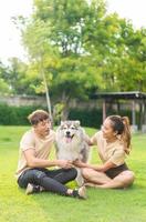 Asian couple love with dog photo