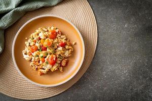 stir-fried tomatoes with egg on plate photo