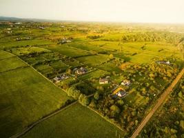 Houses in a rural village by Westport tow near the Irish Atlantic Coast.Greenery and real estate in Ireland concept. Agriculture and irish landscapes photo