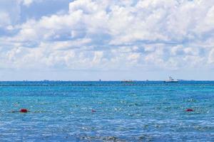 Boats yachts ship jetty beach in Playa del Carmen Mexico. photo