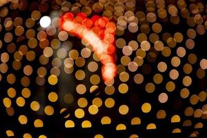 Golden Red Dfocus Abstract bokeh light effects on the night black background texture photo