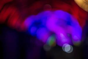 Colorful  Defocus Abstract bokeh light effects on the night black background texture photo