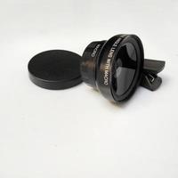 macro camera lens for smartphone isolated on white background photo