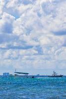 Boats yachts ship jetty beach in Playa del Carmen Mexico. photo