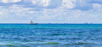 Boats yachts ship jetty beach in Playa del Carmen Mexico. photo