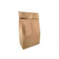 Craft paper bag isolated on white background. photo