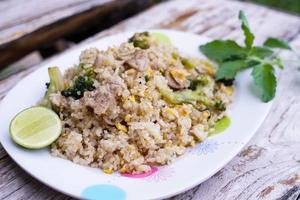Fried rice is an easy and delicious dish. consisting of eggs Pork and broccoli and still affordable during bad economic times. photo