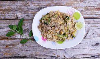Fried rice is an easy and delicious dish. consisting of eggs Pork and broccoli and still affordable during bad economic times. photo