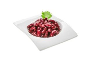 Marinated bean in a bowl on white background photo