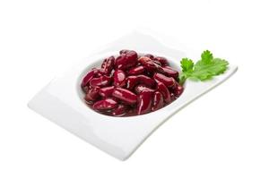 Marinated bean in a bowl on white background photo